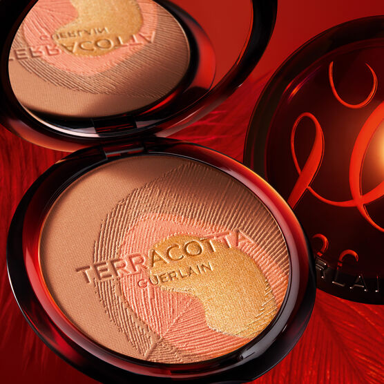 P� BRONZEADOR TERRACOTTA PEACOCK - EDI��O LIMITADA